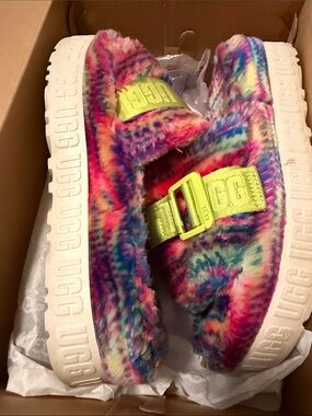 UGG women’s Fluffita Pixelate Rainbow Faux-Fur Slide with Neon Yellow Buckle